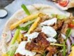 Featured image for Pork Gyros With Tzatziki Sauce And Pita Bread Recipe