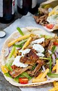 Featured image for Pork Gyros With Tzatziki Sauce And Pita Bread Recipe