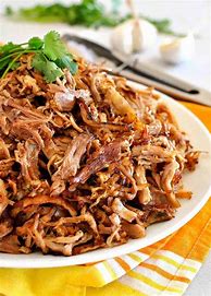 Featured image for Slow-Cooked Pork Carnitas With Cilantro And Lime