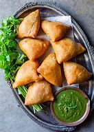 Featured image for How To Make Crispy Lamb Samosas With Mint Chutney