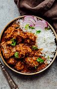 Featured image for Lamb Curry Recipe With Yogurt, Tomatoes, And Fresh Herbs