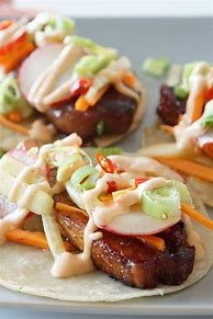 Featured image for Easy Pork Belly Tacos With Avocado Crema And Cilantro