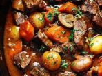 Featured image for Slow-Cooked Beef Bourguignon With Bacon And Mushrooms